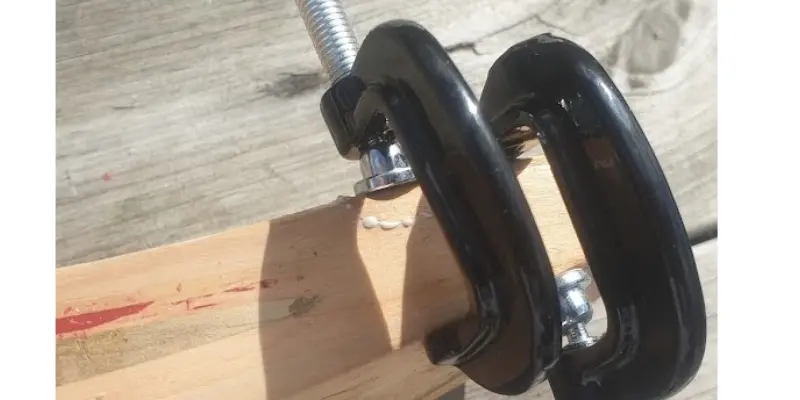 cricket bat in clamps